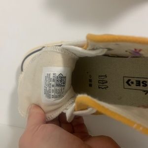 Hand embroidered yellow converse